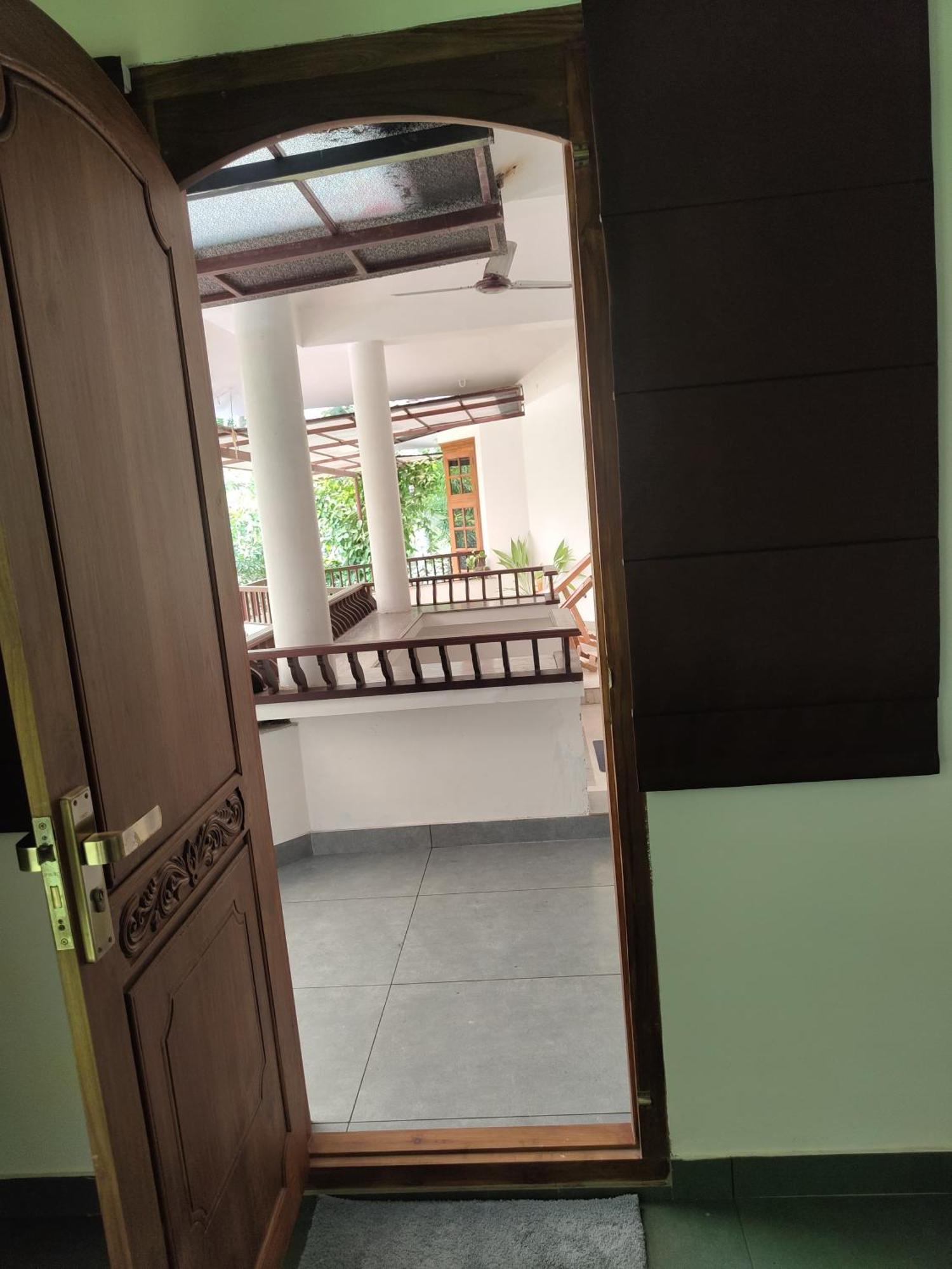 קוז'יקודה Maleyam Homestay Riverside מראה חיצוני תמונה