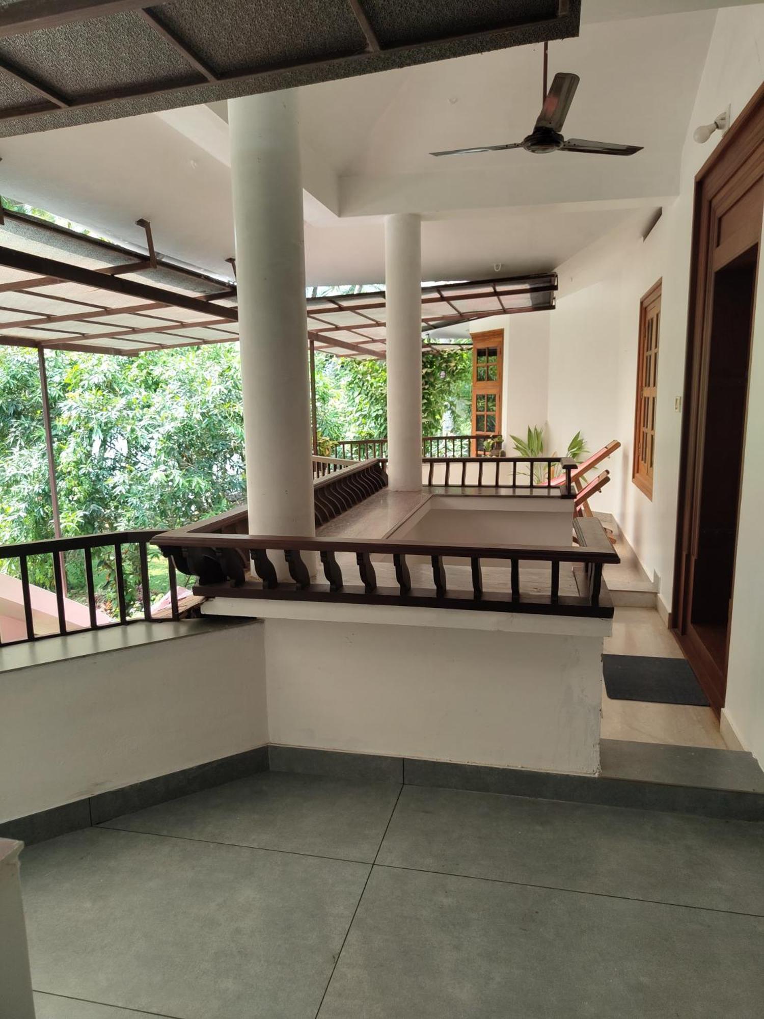 קוז'יקודה Maleyam Homestay Riverside מראה חיצוני תמונה