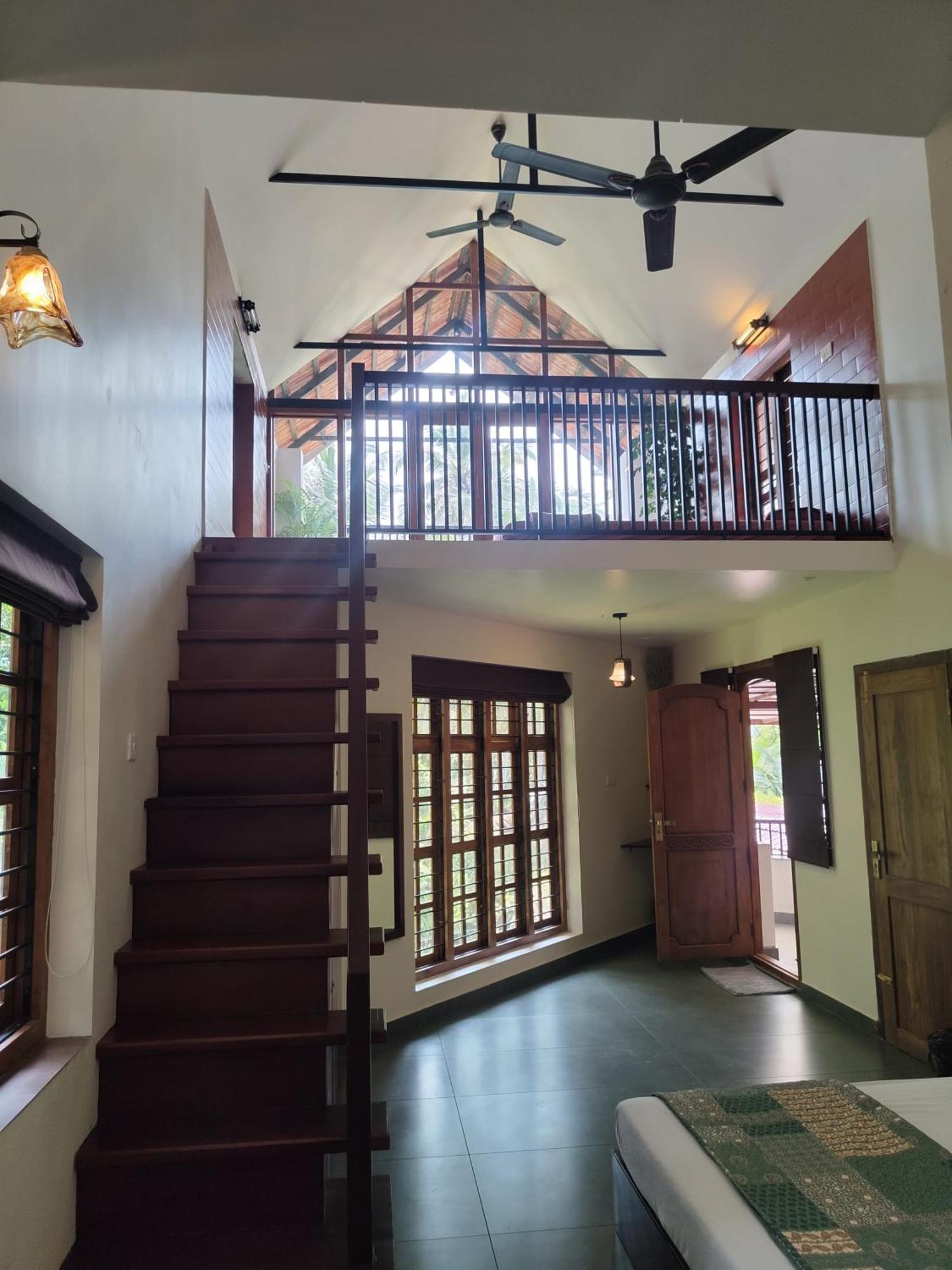 קוז'יקודה Maleyam Homestay Riverside מראה חיצוני תמונה
