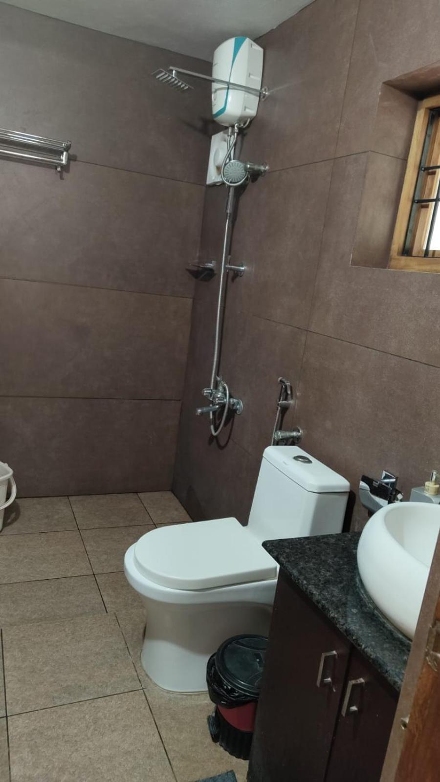 קוז'יקודה Maleyam Homestay Riverside מראה חיצוני תמונה