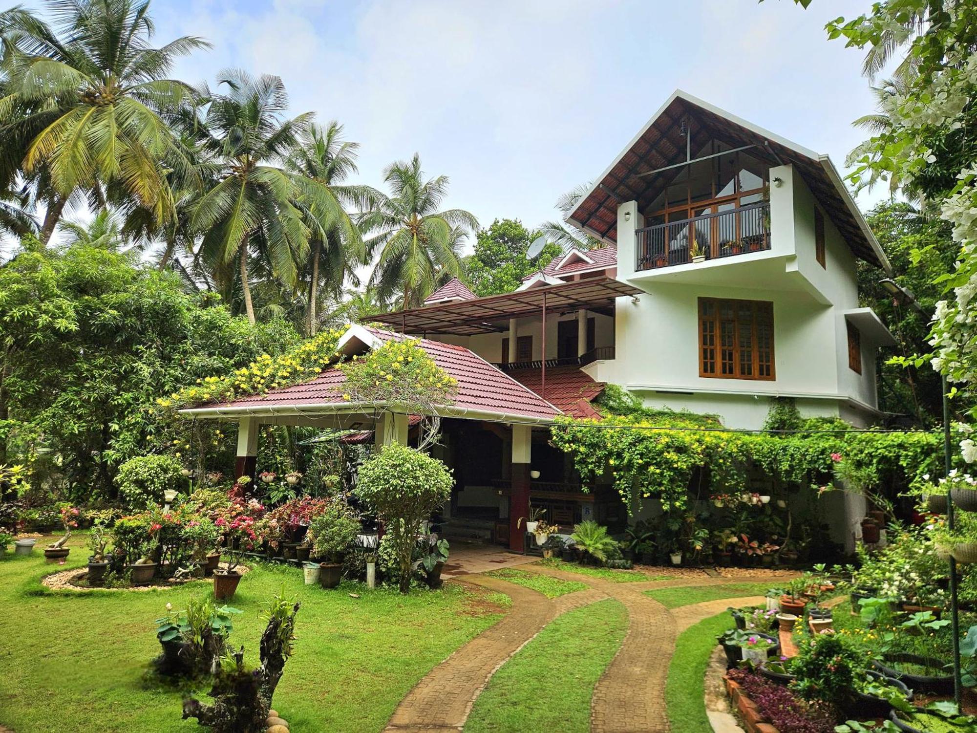 קוז'יקודה Maleyam Homestay Riverside מראה חיצוני תמונה