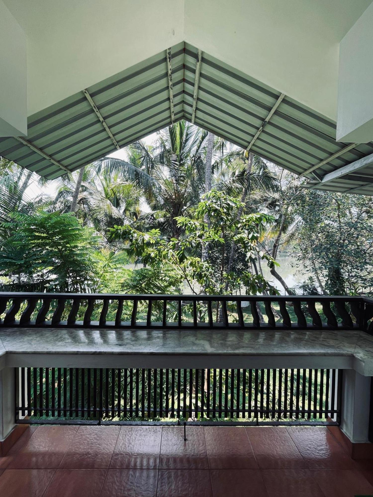 קוז'יקודה Maleyam Homestay Riverside מראה חיצוני תמונה