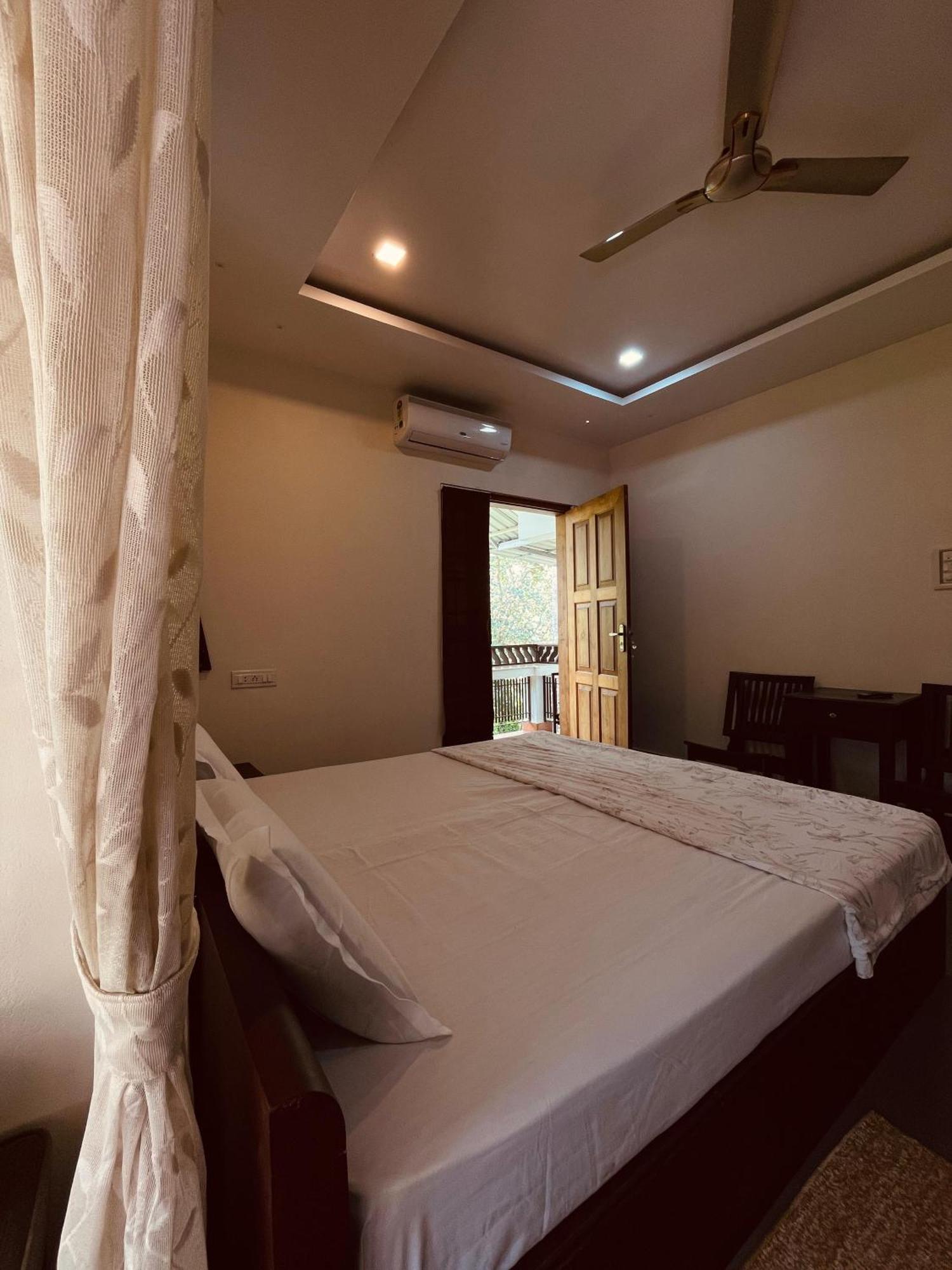 קוז'יקודה Maleyam Homestay Riverside מראה חיצוני תמונה
